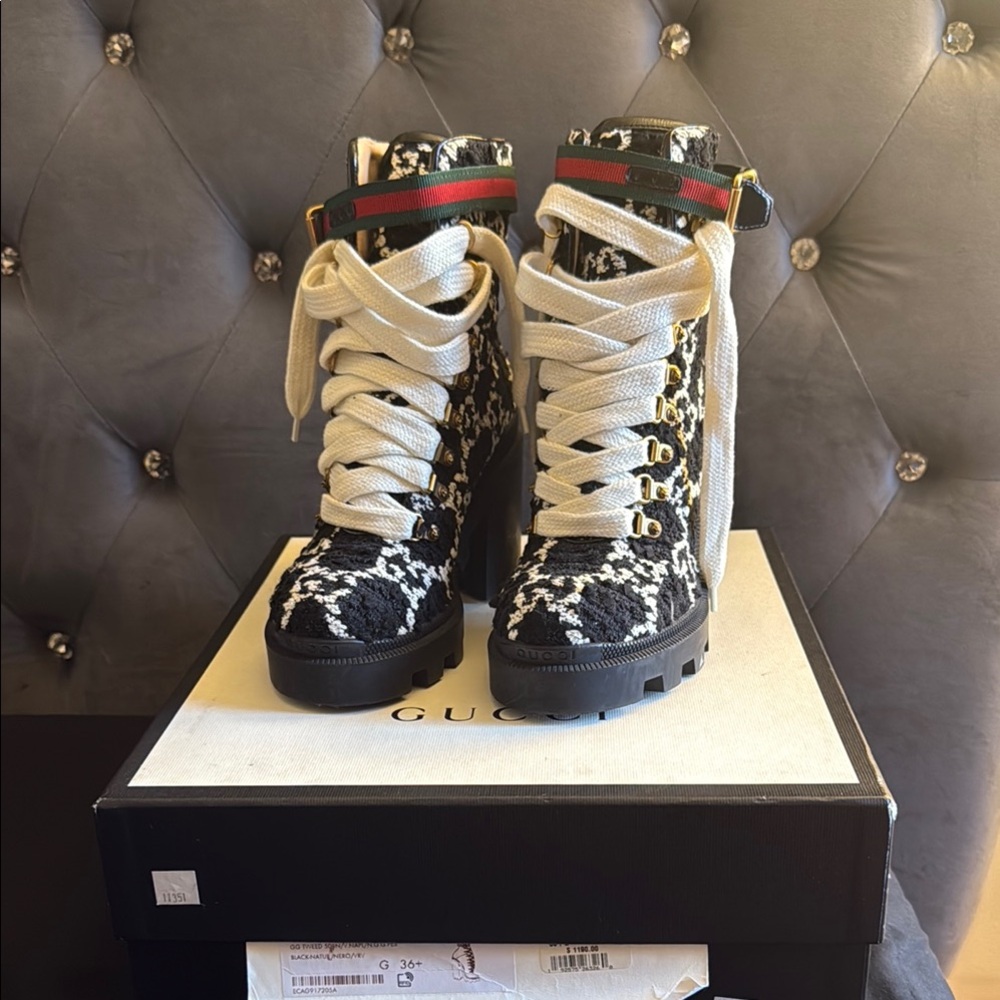 Gucci Black and White Lace-Up Boots with Distinctive Design